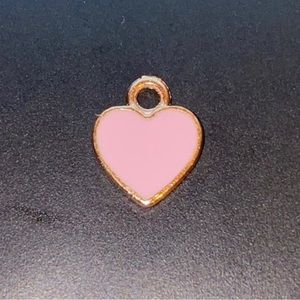 Pink Heart Pendant plated gold 0.6 grams 2CM wide and 2cm long good quality used